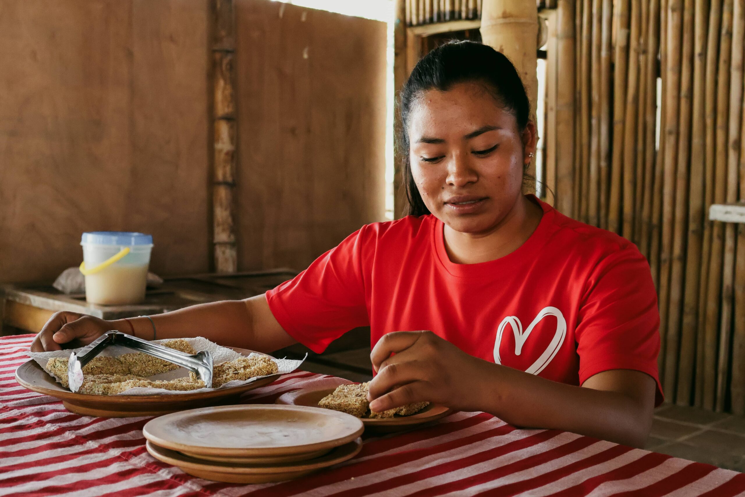 A Mayan Achi woman farmer making amaranth biscuits in Guatemala